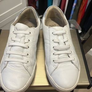 Women white and silver shoes size 5.5  brand is Naturalizer.